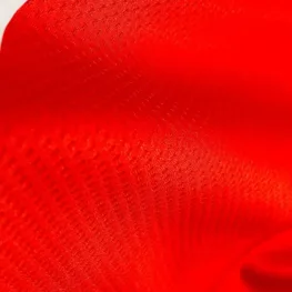 a close up of a red fabric
